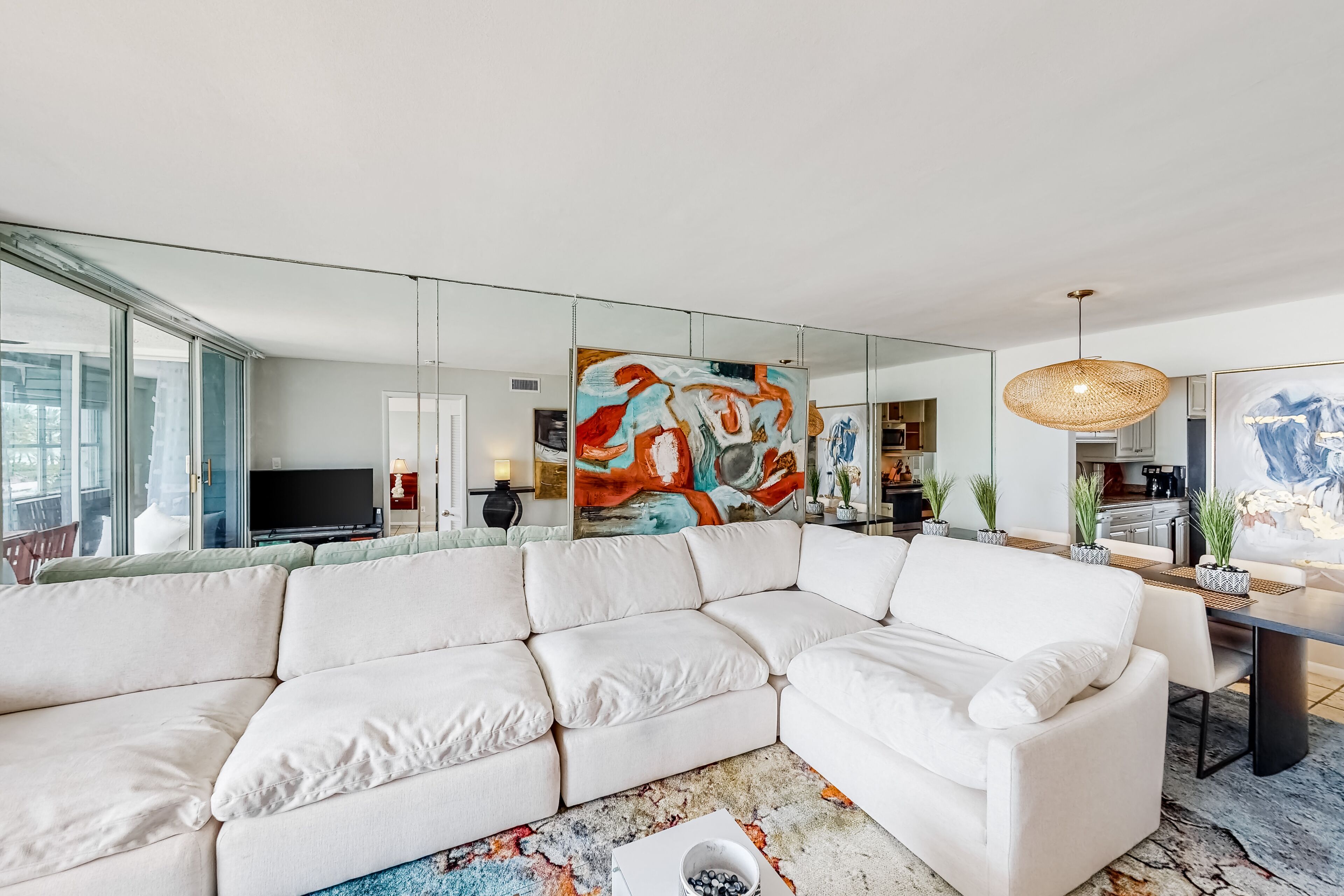 Colorful waterfront condo with pool & hot tub, AC, W/D, & WiFi - dogs OK