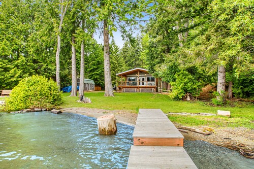 Waterfront home on Lake Whatcom with private dock, beach, firepit & woodstove