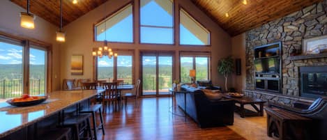 Televisión, chimenea, reproductor de DVD, futbolito