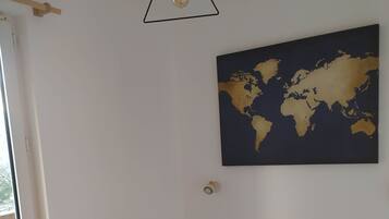 2 bedrooms, iron/ironing board, travel cot