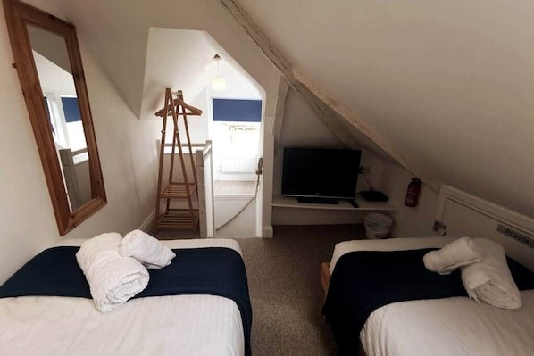 2 habitaciones, tabla de planchar con plancha y wifi gratis 