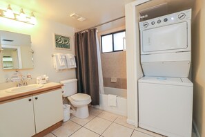 Bathtub, hair dryer, towels