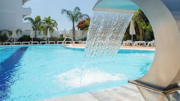 Indoor pool, seasonal outdoor pool, pool umbrellas, pool loungers