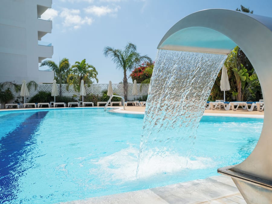 Indoor pool, seasonal outdoor pool, pool umbrellas, sun loungers
