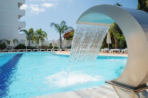 Indoor pool, seasonal outdoor pool, pool umbrellas, sun loungers