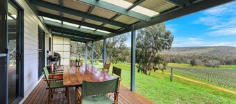 Idyllic Farmhouse overlooking Vineyard on 160 acres