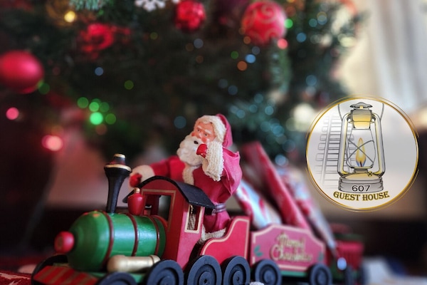 Children staying during the "Santa Train Season" get a gift under the tree.