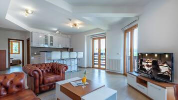 Departamento Grand | Minibar, caja de seguridad en la habitación y cortinas blackout