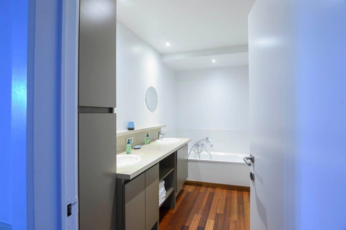 Shower, hair dryer, towels, shampoo