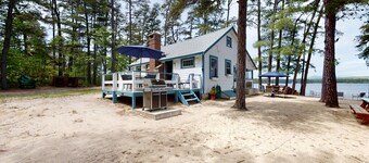 Secluded bayfront cottage with private beach, grill, & bay views
