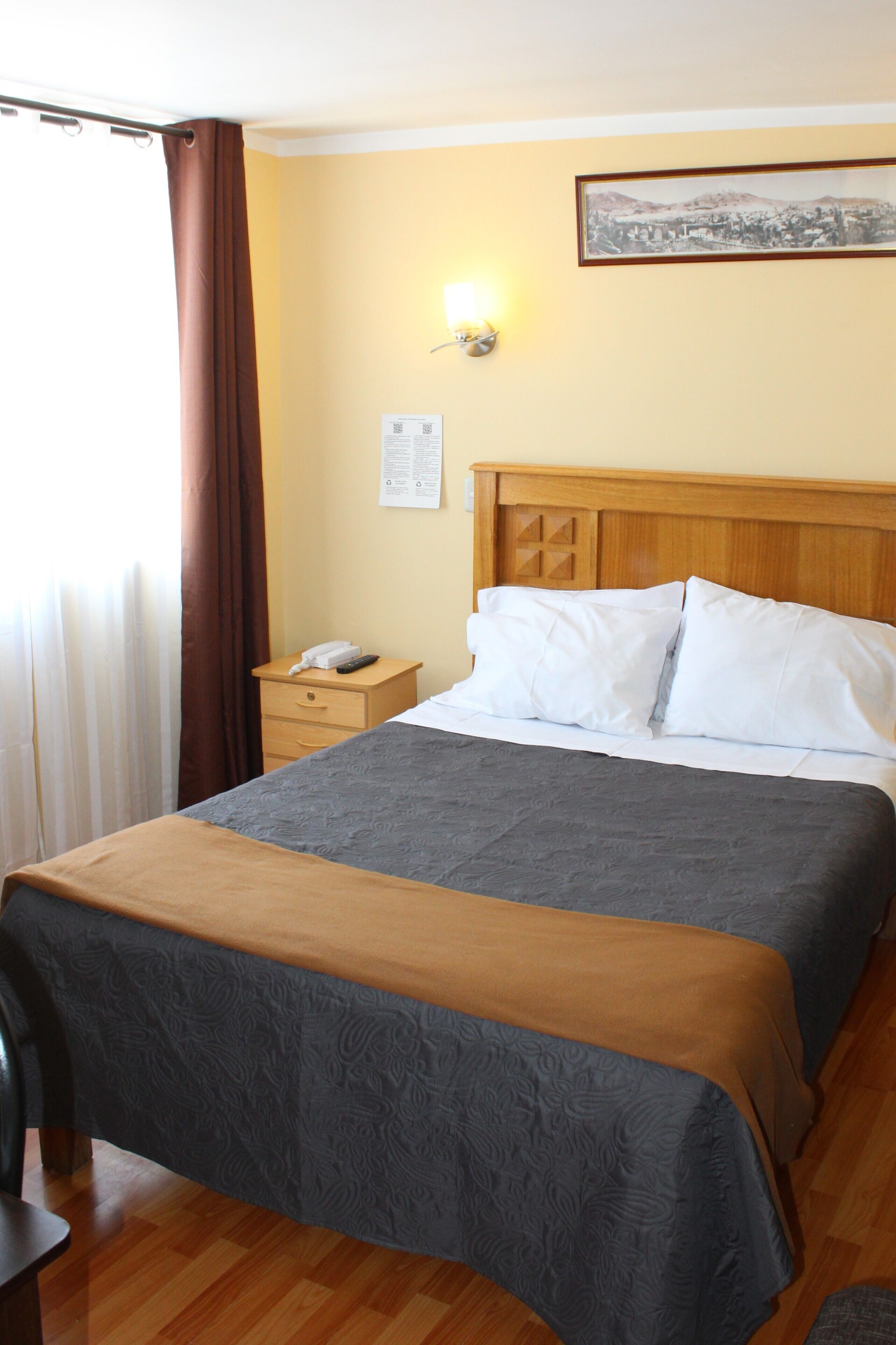 desk, blackout curtains, free wifi, bed sheets