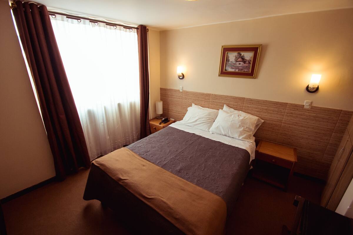 Desk, blackout drapes, WiFi (free), bed sheets