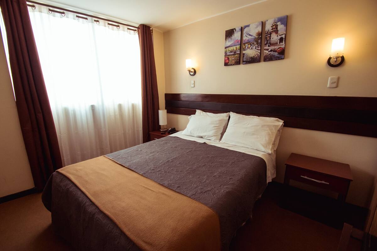 Double Room | Desk, blackout drapes, WiFi (free), bed sheets