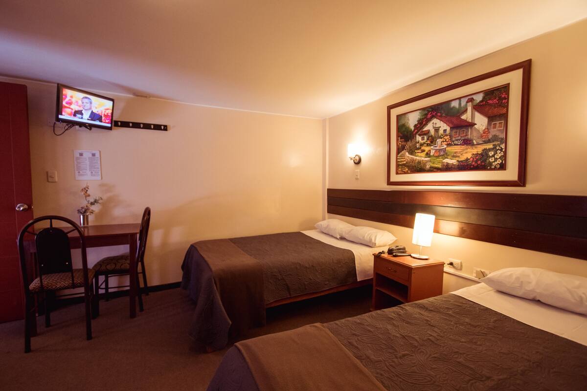 Desk, blackout curtains, free WiFi, bed sheets