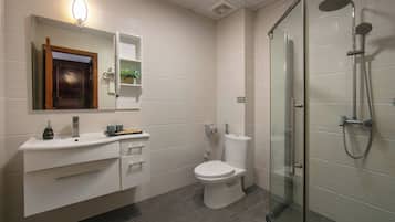 Shower, rainfall showerhead, designer toiletries, hair dryer