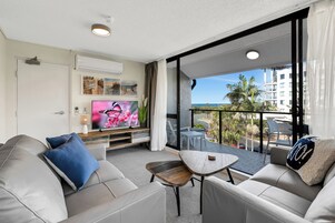 Apartment, 3 Bedrooms (Air-Conditioned) | Living area | Flat-screen TV