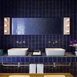 Designer toiletries, hair dryer, bathrobes, slippers