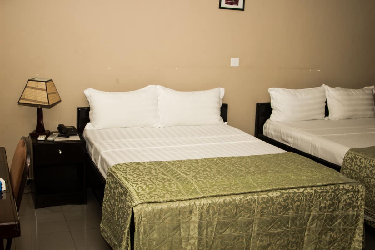 Twin Room | Minibar, in-room safe, desk, iron/ironing board (on request)