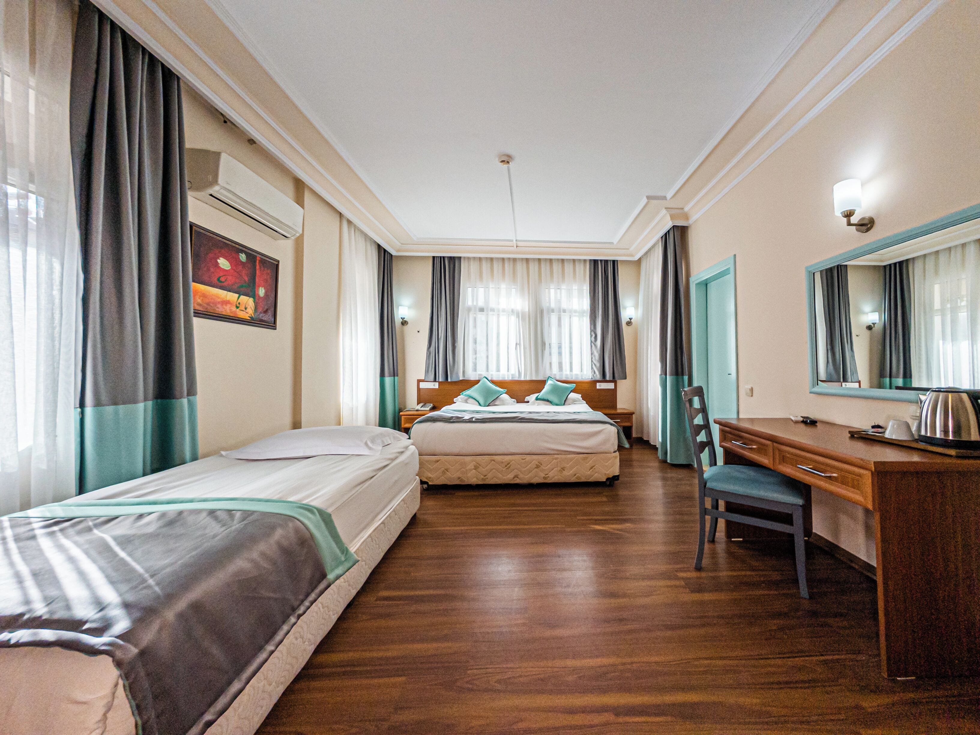 Elite Room | Memory foam beds, minibar, in-room safe, desk