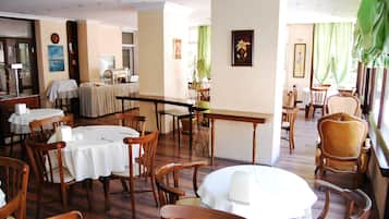 2 restaurants, breakfast, lunch, dinner served; local cuisine