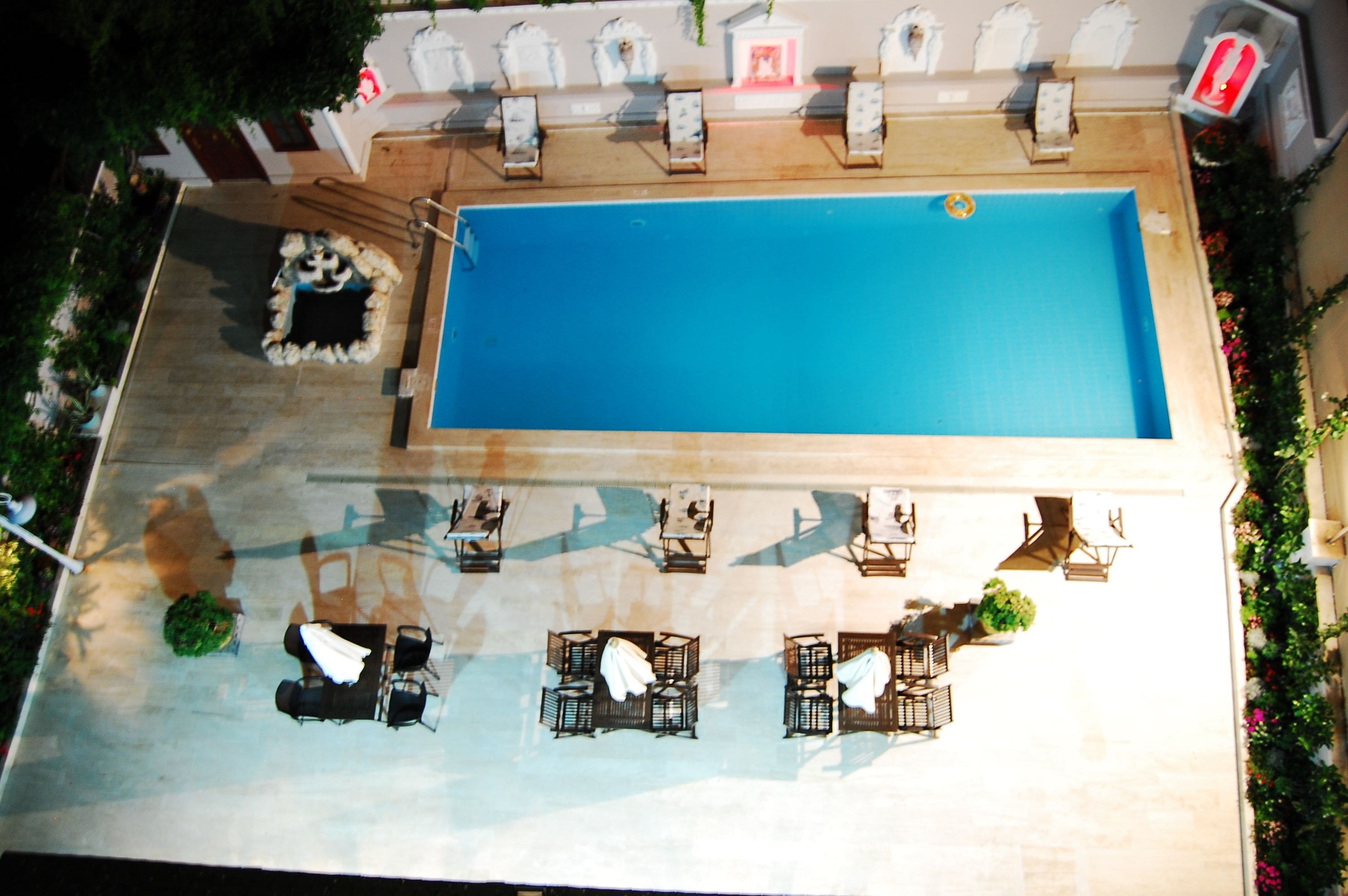 outdoor pool, pool umbrellas, pool loungers