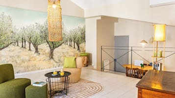 1 Bedroom Apartment | Living area | Flat-screen TV