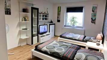 Premium bedding, down comforters, desk, laptop workspace