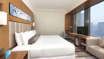 Premium bedding, down comforters, pillowtop beds, in-room safe