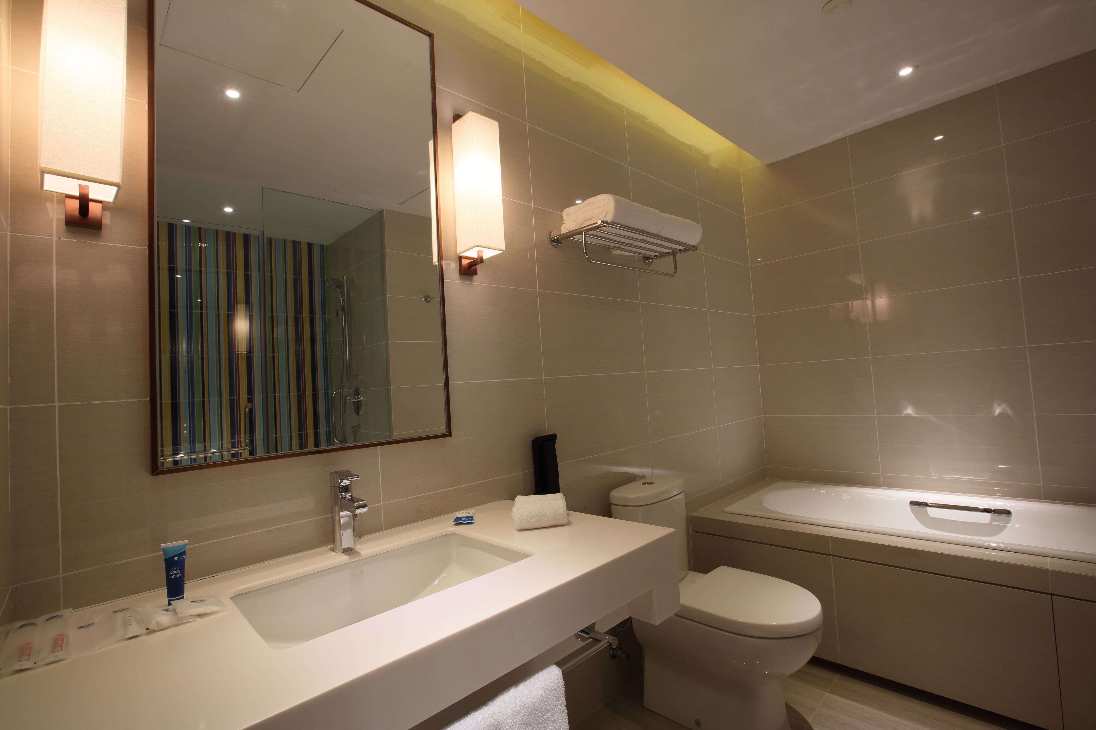 aloft, suite, 1 bedroom, city view | bathroom | separate bathtub and shower, deep-soaking bathtub, rainfall showerhead