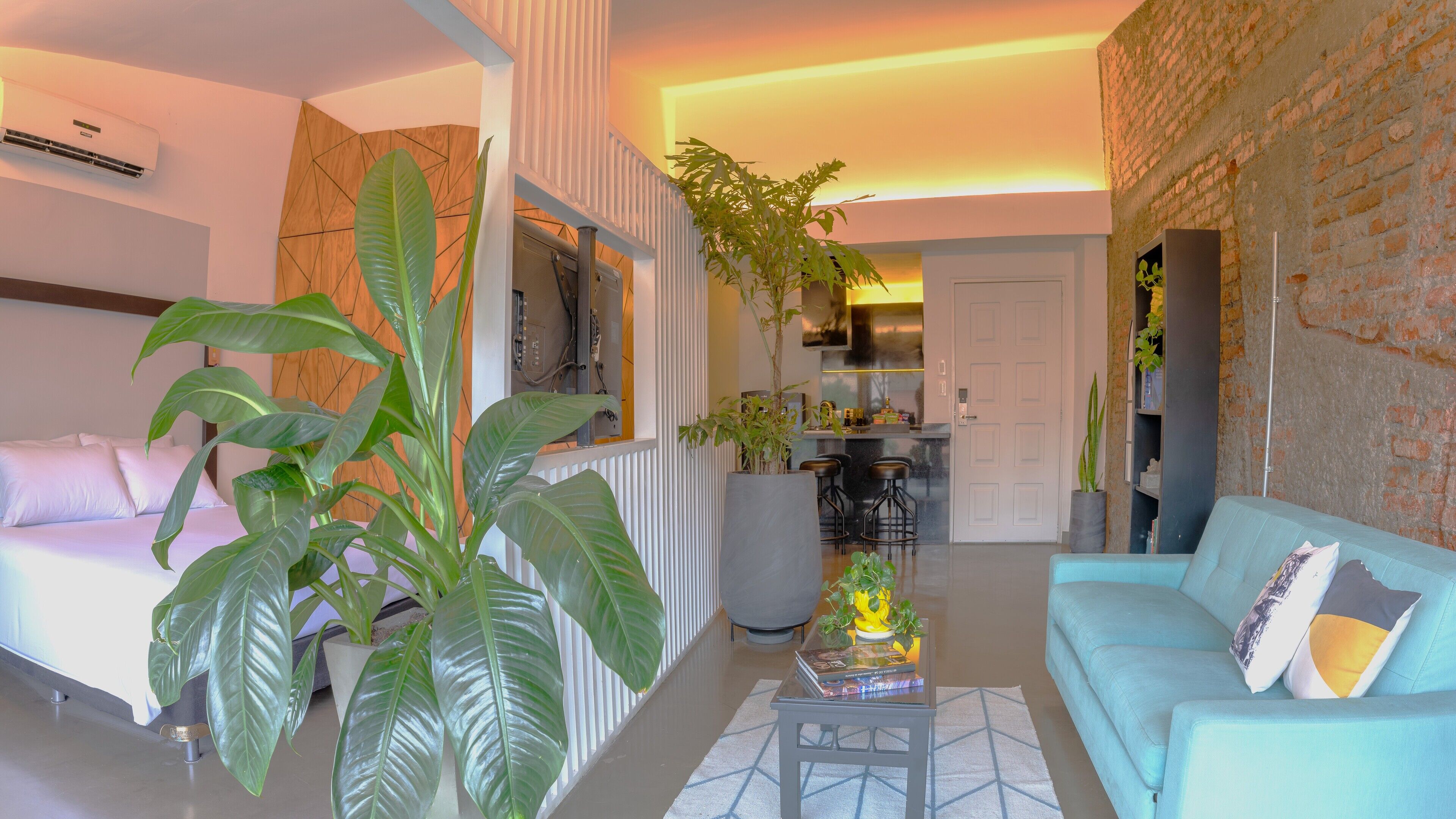 deluxe studio suite, 1 bedroom, city view | living area | 42-inch smart tv with cable channels, tv, heated floors