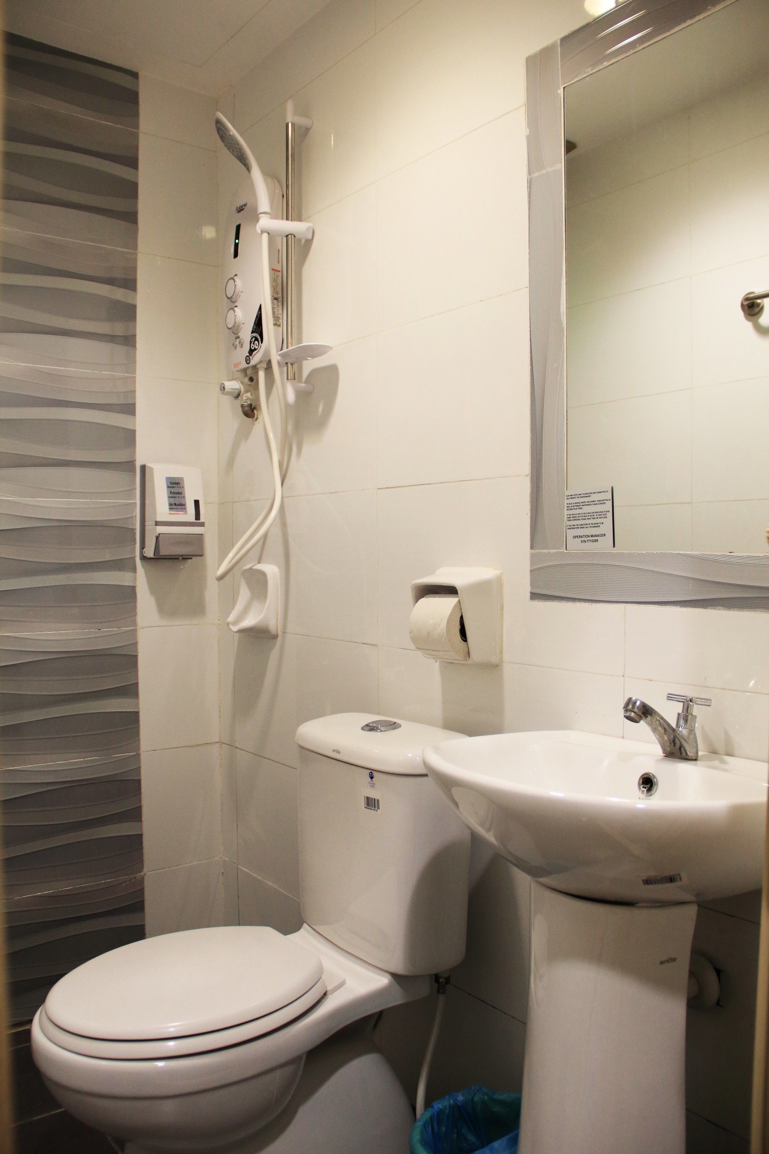 shower, hair dryer, slippers, bidet