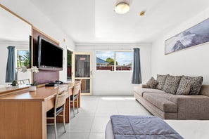 Apartment, 1 Bedroom | Living area | Plasma TV