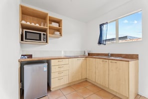 Apartment, 1 Bedroom | Private kitchen | Fridge, microwave, coffee/tea maker
