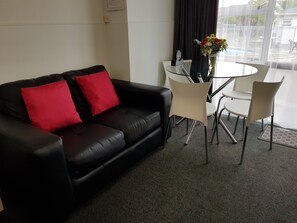 Dollarwise Family One Bedroom | Living area - Courtesy Court Motel (Nelson)