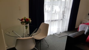 Studio, 1 King Bed | Living area - Courtesy Court Motel (Nelson)