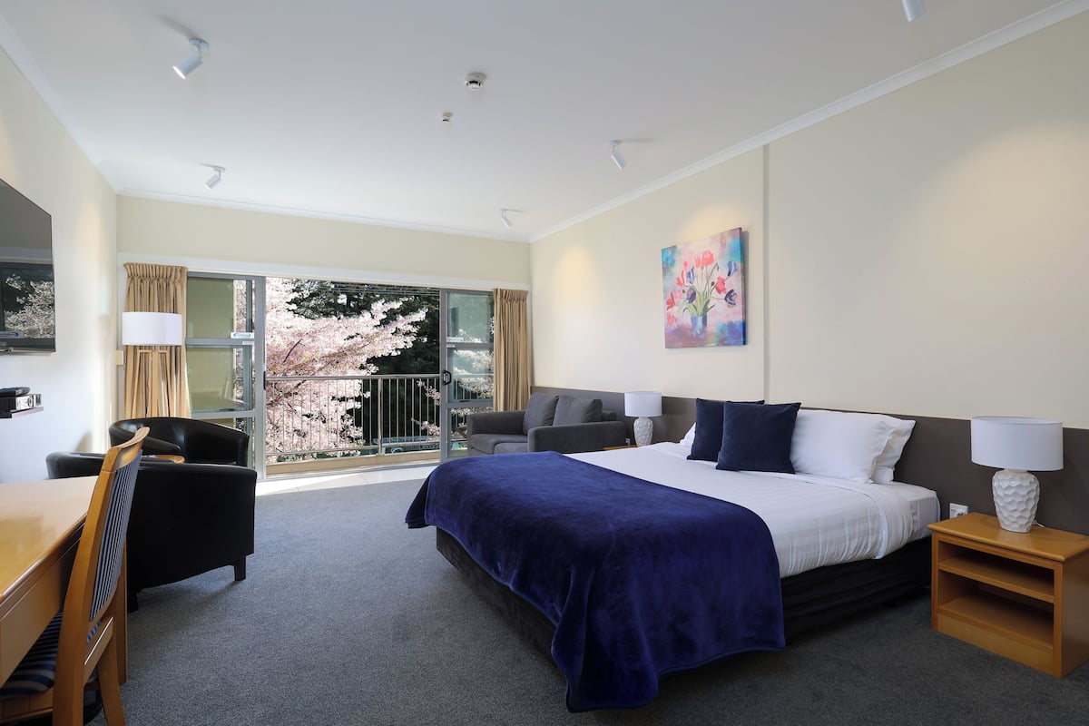 Premium bedding, memory foam beds, desk, laptop workspace