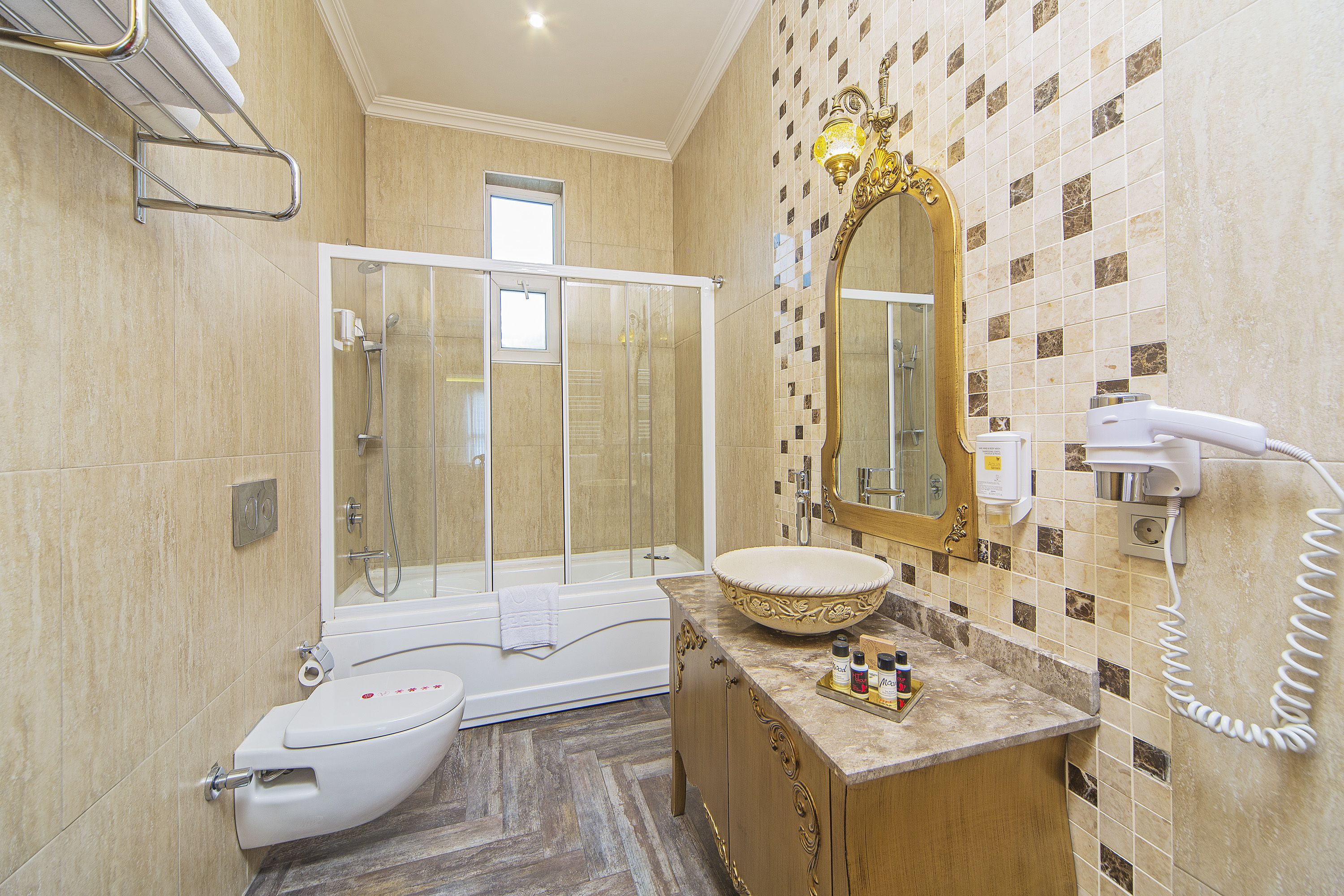 king suite, 1 bedroom, balcony, city view | bathroom | combined shower/bathtub, jetted bath, free toiletries, hair dryer
