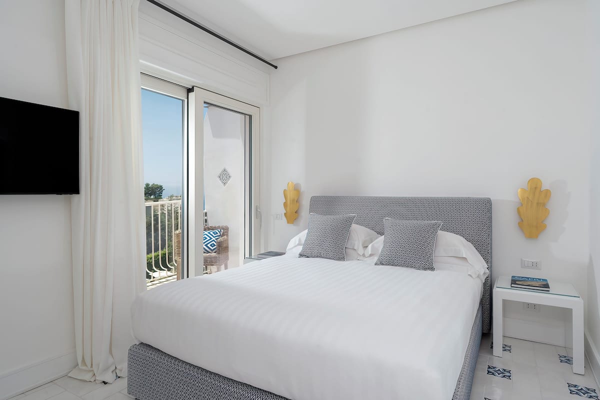 Suite, Sea View (Dependance) | 1 bedroom, Frette Italian sheets, premium bedding, down comforters
