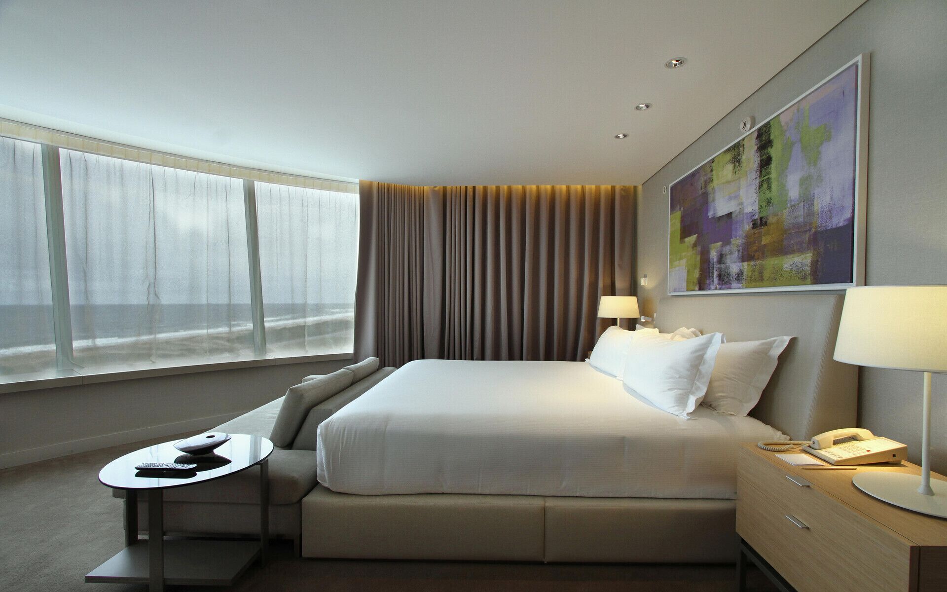 Premium bedding, down duvets, minibar, in-room safe