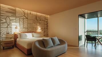 Deluxe Room, 1 King Bed, Partial Sea View | Premium bedding, down comforters, minibar, in-room safe