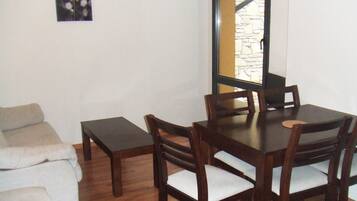 Apartment, 1 Bedroom | Living room | TV