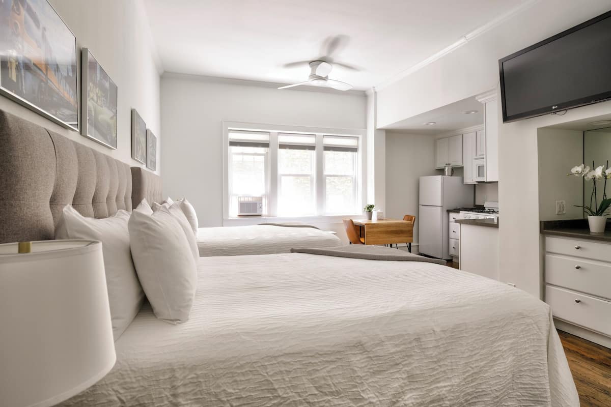 Deluxe Room, 2 Queen Beds | 2 bedrooms, iron/ironing board, free WiFi, bed sheets