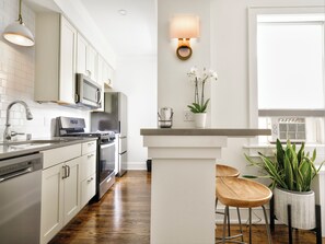 Premier Room, 1 Queen Bed | Private kitchen | Full-sized fridge, microwave, stovetop, coffee/tea maker
