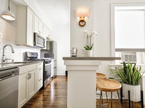 Premier Room, 1 Queen Bed | Private kitchen | Full-sized fridge, microwave, stovetop, coffee/tea maker