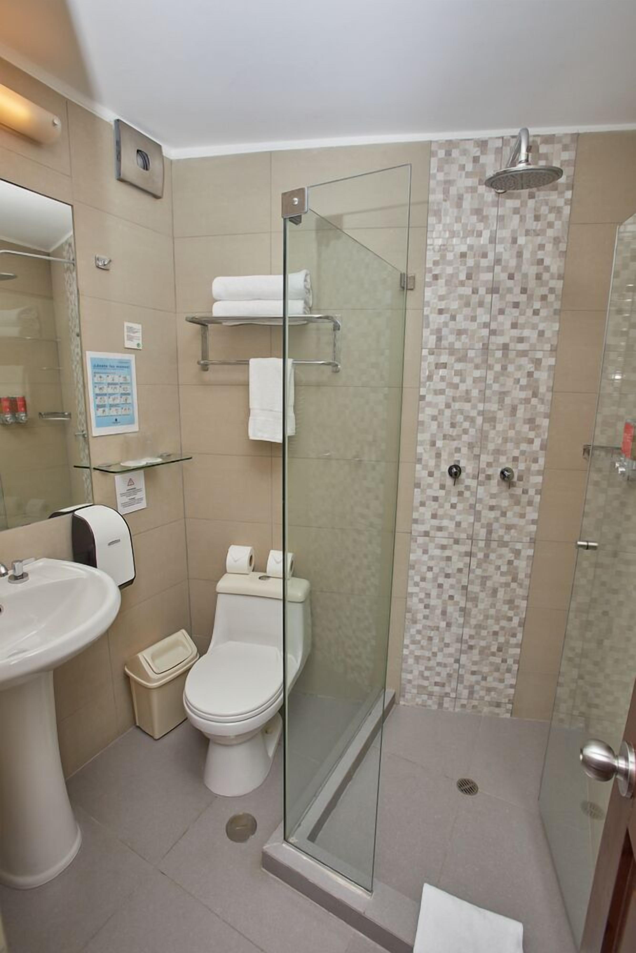 standard single room | bathroom | shower, free toiletries, hair dryer, towels