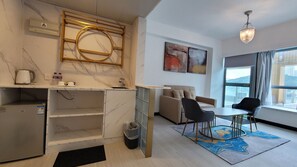 Family Seaview Suite with balcony | Living area | 40-inch LCD TV with cable channels, TV