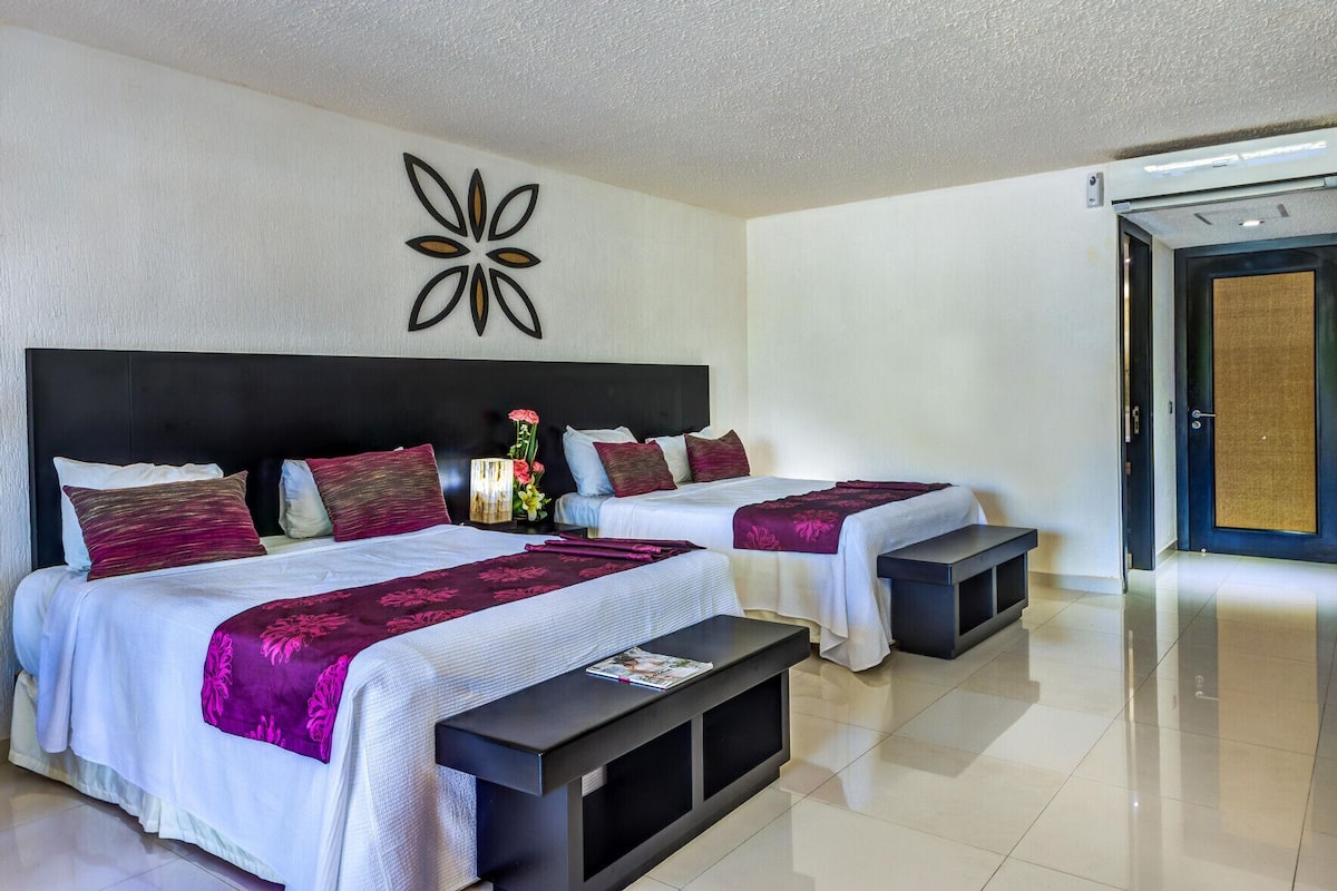Seprai premium, selimut bulu angsa, minibar, dan brankas