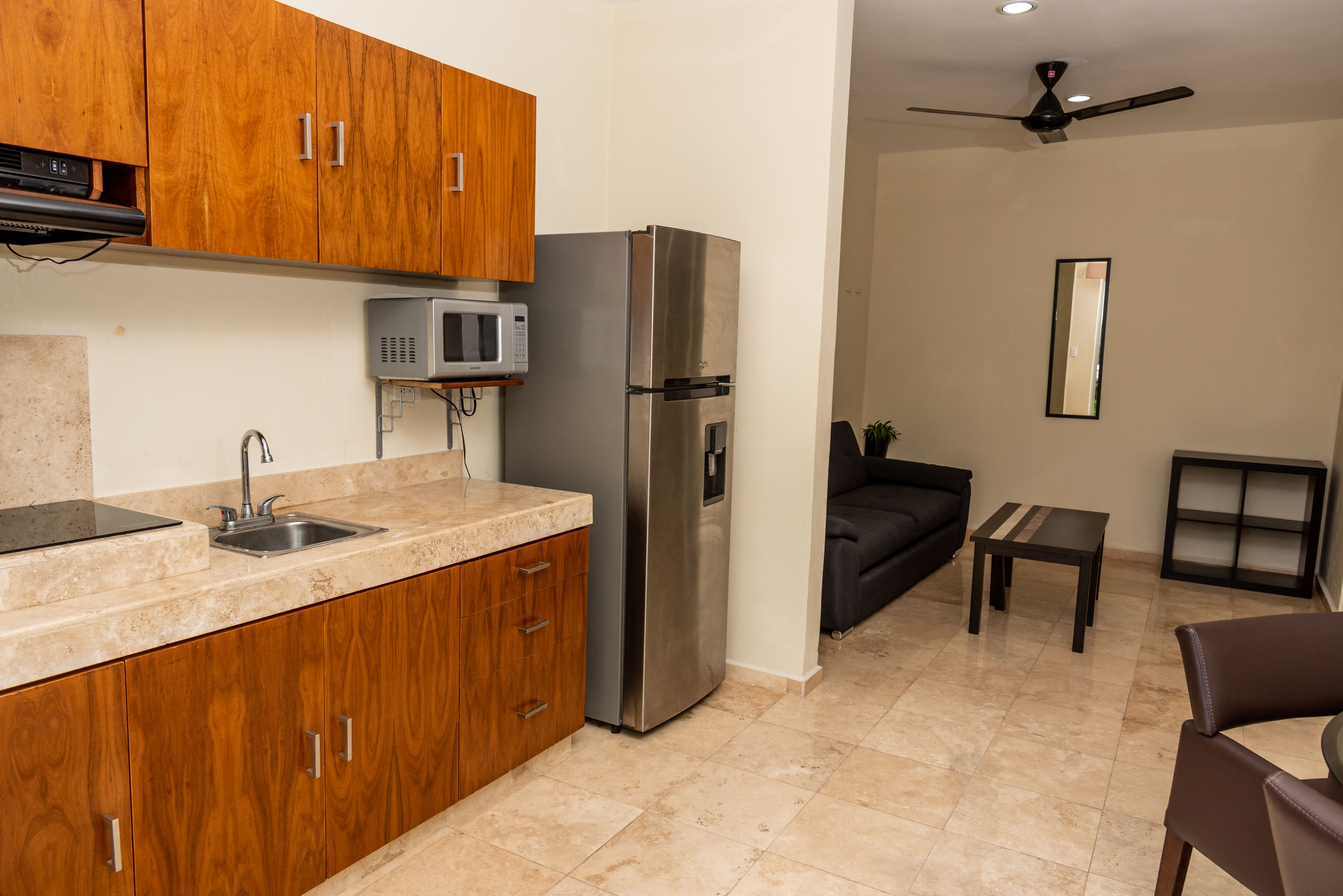 deluxe apartment, multiple beds | private kitchen