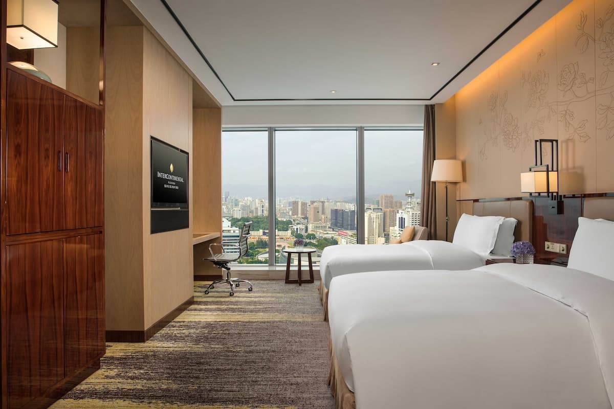 premium bedding, down duvets, memory-foam beds, minibar