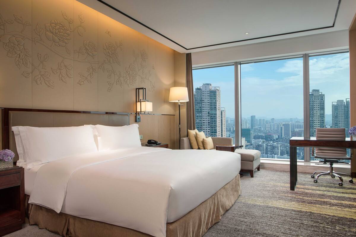 premium bedding, down duvets, memory-foam beds, minibar